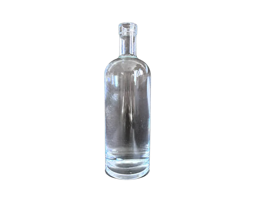 Clear cylindrical glass bottle with a clear stopper on a dark textured background