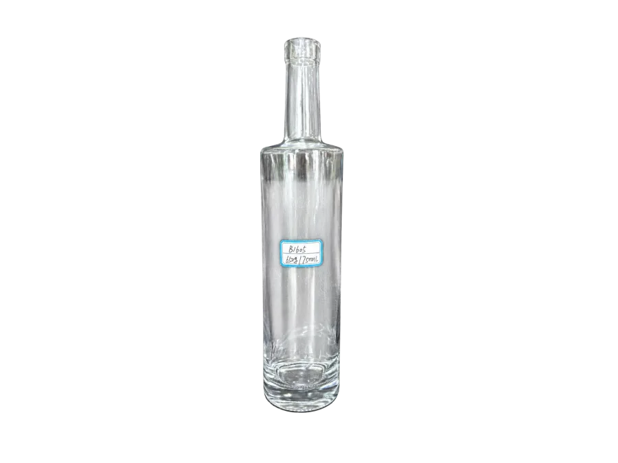 Empty clear 750ml glass bottle with a handwritten 650g label against a gray textured background