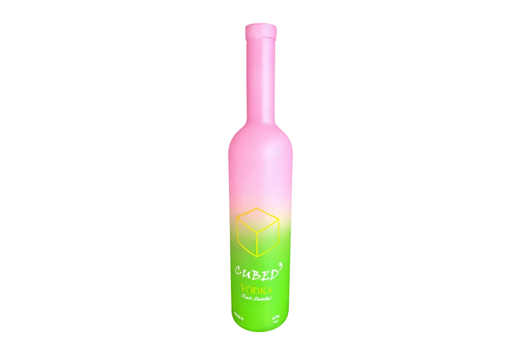 Pink-to-green gradient CUBED&sup3; VODKA bottle with a yellow cube graphic and visible 750 ml and 40% vol labels